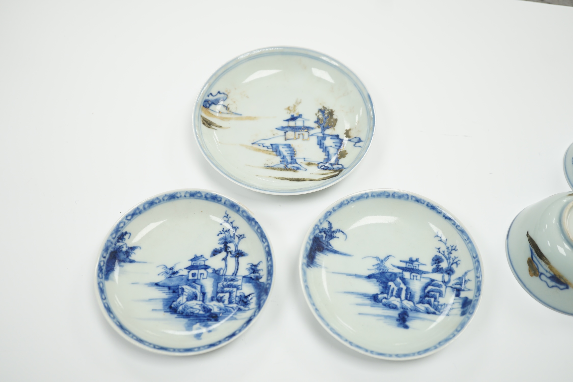 Three Chinese blue and white Nanking Cargo teabowls and saucers, largest 11.5cm diameter